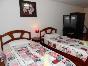 Postel nebo postele na pokoji v ubytování MT-Room