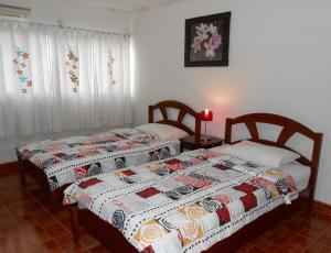 Postel nebo postele na pokoji v ubytování MT-Room