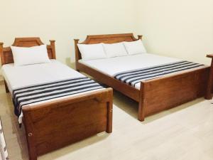 Кровать или кровати в номере Sweet Home Tourist Rest, Cooking Classes & Tours