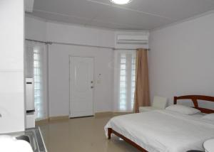 Postel nebo postele na pokoji v ubytování MT-Room