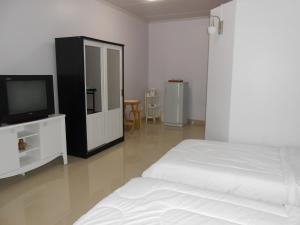 Postel nebo postele na pokoji v ubytování MT-Room
