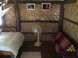 Una cama o camas en una habitación de Sang Tong Huts