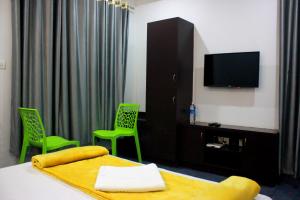 Μια τηλεόραση ή/και κέντρο ψυχαγωγίας στο Vintage Garden Resort