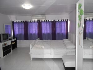 Postel nebo postele na pokoji v ubytování MT-Room