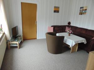 TV a/nebo společenská místnost v ubytování Ferienwohnung Ehrich nahe Otterndorf + 2 fotografie