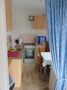 Kuchyň nebo kuchyňský kout v ubytování Ferienwohnung Ehrich nahe Otterndorf