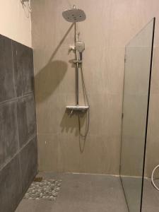Baðherbergi á Lazy Inn Kuta Lombok