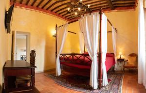 Postel nebo postele na pokoji v ubytování Hotel Il Castello + 37 fotografií