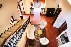 an overhead view of a staircase in a house at Hotel Il Castello in Certaldo