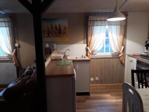 Kuchyň nebo kuchyňský kout v ubytování Old West Ranch "Urlaub auch mit Pferd möglich"