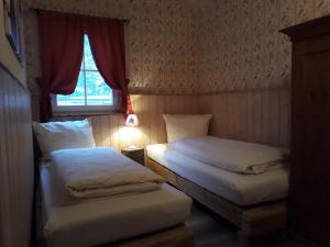 Postel nebo postele na pokoji v ubytování Old West Ranch "Urlaub auch mit Pferd möglich"