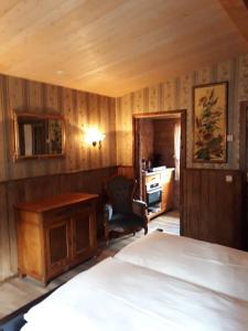 Postel nebo postele na pokoji v ubytování Old West Ranch "Urlaub auch mit Pferd möglich"