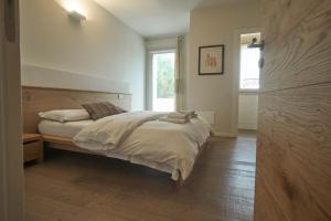 Postel nebo postele na pokoji v ubytování Agriturismo CasaMela