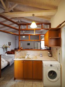 A kitchen or kitchenette at Sophia Areopoli Tower House