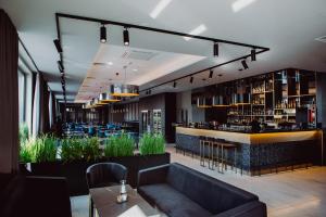 The lounge or bar area at Hotel Evva