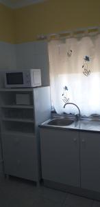Kuchyň nebo kuchyňský kout v ubytování Alojamento Dias + 26 fotografií