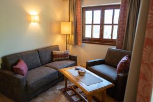 A seating area at Familienhotel Gasthof Hinteregger