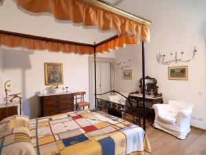 Postel nebo postele na pokoji v ubytování Giardino D'Azeglio Locazione Turistica