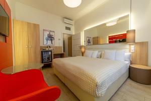 Posteľ alebo postele v izbe v ubytovaní Salvator Boutique Hotel vegan-friendly