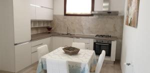 Köök või kööginurk majutusasutuses Agliadò