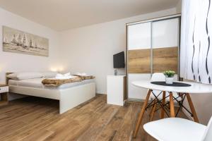 Postel nebo postele na pokoji v ubytování Apartments Mateo