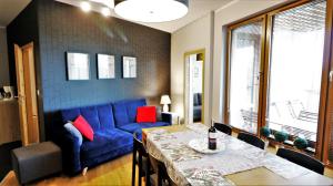 Posedenie v ubytovaní APARTAMENT z 3 SYPIALNIAMI PRZY PLAŻY