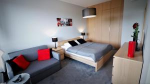 Posteľ alebo postele v izbe v ubytovaní APARTAMENT z 3 SYPIALNIAMI PRZY PLAŻY
