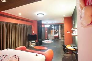 Кровать или кровати в номере Fahrenheit Hotels & Resorts