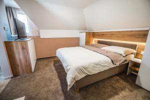 Кровать или кровати в номере Guesthouse Mars
