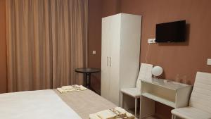 TV a/nebo společenská místnost v ubytování MARIANA - guest rooms