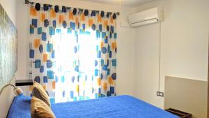 A bed or beds in a room at Los Caňos II - Calm Home - Option cheap parking