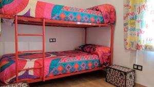 A bed or beds in a room at Los Caňos II - Calm Home - Option cheap parking