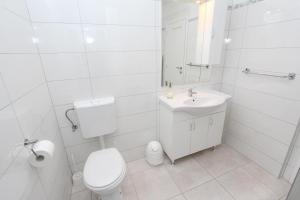 Łazienka w obiekcie Apartments Palaziol