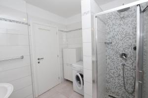 Łazienka w obiekcie Apartments Palaziol