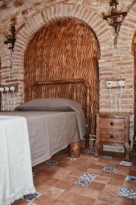 Łóżko lub łóżka w pokoju w obiekcie Antiguo Rincón