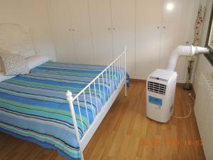 Apartament Besalú 객실 침대