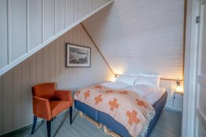 Postel nebo postele na pokoji v ubytování Nyvågar Rorbuhotell - by Classic Norway Hotels