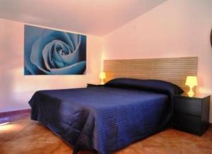 Postel nebo postele na pokoji v ubytování Villa Smeraldo Roma