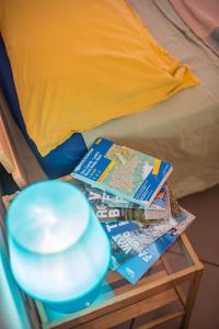 A bed or beds in a room at Little Arco Guest House