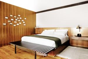 Postel nebo postele na pokoji v ubytování Square Nine Hotel Belgrade-The Leading Hotels of The World + 37 fotografií