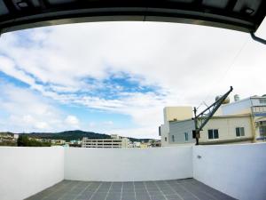 a view from the roof of a building with the sky at ALL BLUE in Hengchun