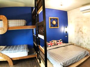 Letto o letti in una camera di ALL BLUE