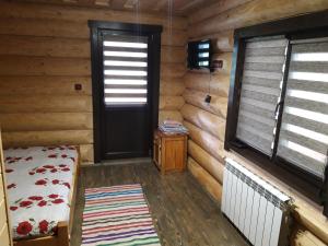 Postel nebo postele na pokoji v ubytování Маєток горгани