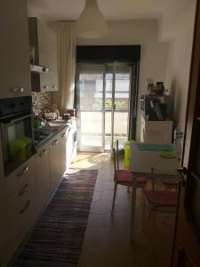 مطبخ أو مطبخ صغير في Appartamento Ganzirri
