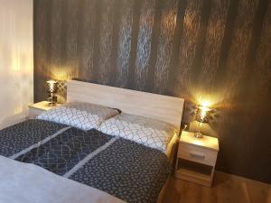 Postel nebo postele na pokoji v ubytování Margareta Home