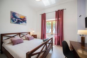 Postel nebo postele na pokoji v ubytování B&B PROCHYTEA