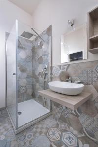 Koupelna v ubytování Residence Serenella - Dependance + 24 fotografií