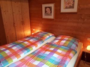 Postel nebo postele na pokoji v ubytování Milena-Hütte