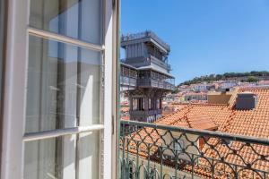 a view of a building from a window at Downtown Apartment Santa Justa in Lisbon