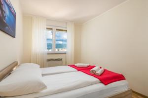 Posteľ alebo postele v izbe v ubytovaní Orchidea apartment